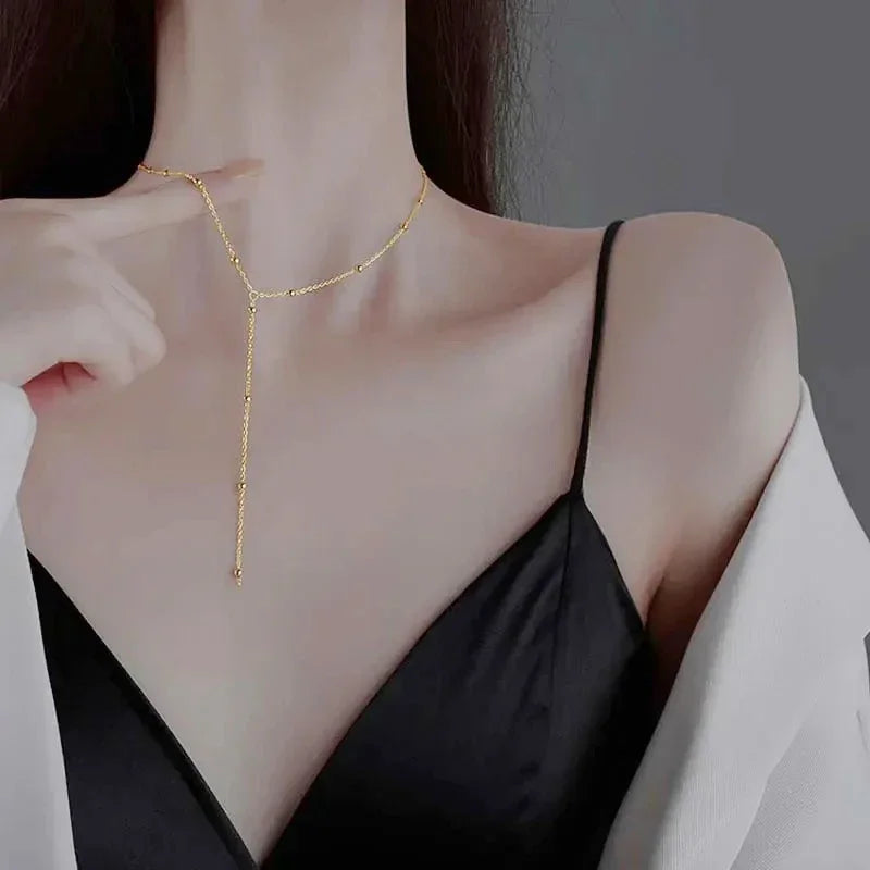 LATS Gold Double Layered Tassel Chain Necklace – Geometric Bead Choker for Women